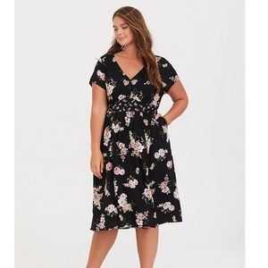 2x black floral dress.